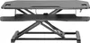 A black adjustable standing desk converter is shown from the front against a white background. Anteprima dell’immagine prodotto