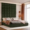 A bedroom scene featuring a bed with a large upholstered headboard. Anteprima dell’immagine prodotto