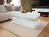 A modern living room with a white coffee table, sofa, and fireplace. Produktbild-Vorschau