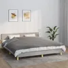 A bedroom scene with a bed, two framed pictures on the wall, and a potted plant. Produktbild-Vorschau