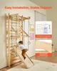 A child climbing on a wooden indoor gym set attached to a wall. Anteprima dell’immagine prodotto