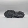 The sole of a black shoe is shown against a plain background. Produktbild-Vorschau