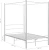 A white metal canopy bed frame with dimensions indicated. Náhled obrázku produktu