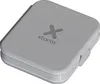 A gray wireless charger with the Xtorm logo and a plus sign embossed on its surface. Voir les images du produit