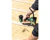 A person is using a cordless impact driver to screw a piece of wood into a larger wooden surface. Voir les images du produit