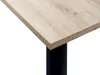 A close-up view of a desk corner with a wood-grain surface and a black leg. Produktbild-Vorschau
