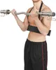 A man is using a biceps isolator with a barbell. Náhľad obrázku produktu