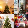 A collage of four images showing Christmas trees and families decorating them, with a focus on tree toppers. Produktbild-Vorschau