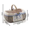 A wicker basket with a fabric lining and decorative elements, shown with dimensions indicated. Produktbild-Vorschau