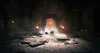 A dark, atmospheric chamber with a large stone structure in the center, illuminated by torches and glowing magical effects. Produktbild-Vorschau