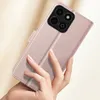 A hand holding a rose gold phone case with a built-in stand. Produktbild-Vorschau