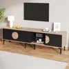 A modern TV stand with a TV mounted above it, in a living room setting. Anteprima dell’immagine prodotto