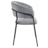 A side view of a gray velvet dining chair with black metal legs. Produktbild-Vorschau