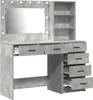 A makeup vanity table with a mirror and shelves, presented against a white background. Voir les images du produit