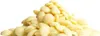 A pile of white chocolate chips on a white background. Anteprima dell’immagine prodotto