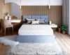 A bedroom scene featuring a bed with a mattress, a vanity table, and decor. Produktbild-Vorschau