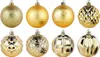 A collection of eight gold Christmas ornaments arranged in two rows of four. Náhled obrázku produktu