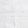 A close-up view of white sheer fabric with embroidered details. Produktbild-Vorschau