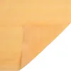 A piece of orange fabric is folded in half, showing two different textures. Produktbild-Vorschau