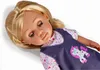 A doll lying on its back, with its eyes closed. Anteprima dell’immagine prodotto