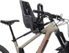 A child bike seat and handlebars attached to the front of a mountain bike. Produktbild-Vorschau