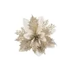 A single gold and white glitter poinsettia flower decoration. Produktbild-Vorschau