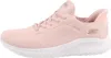 A side view of a pink Skechers slip-in sneaker with a white sole. Voir les images du produit