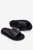 A pair of black slides on a white background. Podgląd zdjęcia produktu