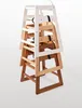 A stack of four wooden high chairs. Podgląd zdjęcia produktu