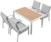 A white metal outdoor dining set with four gray cushioned chairs and a slatted wood-look tabletop. Produktbild-Vorschau