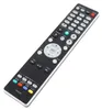 A black remote control with various buttons and labels, shown from a slightly elevated diagonal angle against a white background. Podgląd zdjęcia produktu