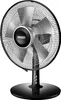 A black oscillating table fan with silver blades and a black base. Produktbild-Vorschau