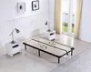 A bedroom scene with a bed frame, two nightstands, and lamps. Produktbild-Vorschau