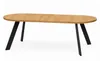 A wooden oval table with black legs on a white background. Produktbild-Vorschau