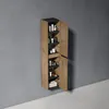 A tall, narrow cabinet with two doors, mounted on a gray wall. The cabinet has wood-grain doors and black accents. It contains multiple shelves filled with toiletries and two folded towels at the bottom. Anteprima dell’immagine prodotto