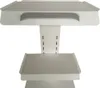 A close-up, front-facing view of a white and gray rolling cart or trolley, shown against a white background. Náhled obrázku produktu