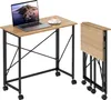 A foldable desk with a laptop and a cup of coffee on it, shown in both open and folded states. Podgląd zdjęcia produktu