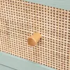 A close-up view of a drawer front of a dresser or cabinet, featuring a rattan weave texture and a wooden knob. Anteprima dell’immagine prodotto