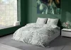 A bedroom scene with a bed featuring a leaf-patterned duvet cover. Anteprima dell’immagine prodotto