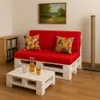 A living room scene with a pallet sofa and coffee table. Produktbild-Vorschau