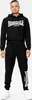 A man wearing a black Lonsdale tracksuit. Produktbild-Vorschau