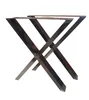 A pair of metal table legs with an X-shaped design.