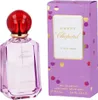 A perfume bottle and its packaging are displayed side-by-side against a white background. Voir les images du produit
