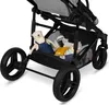 Close-up view of the storage basket of a baby stroller, filled with baby items and a teddy bear. Anteprima dell’immagine prodotto