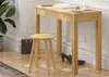 A wooden stool and a wooden console table are shown in a room setting. Produktbild-Vorschau
