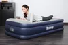 A woman is lying on an inflatable mattress and using a tablet. Náhled obrázku produktu