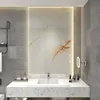 A modern bathroom vanity with a marble countertop and a large, illuminated mirror with a marble-like design. Produktbild-Vorschau