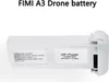 A white drone battery with labels on it, set against a white background. Náhled obrázku produktu
