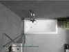 A top-down view of a modern bathroom with a bathtub, shower, and tiled walls. Produktbild-Vorschau