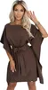 A woman wearing a brown dress. Produktbild-Vorschau